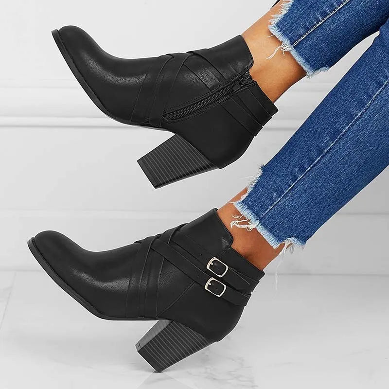 Plus size women's short boot with a 7cm stout heel and side zipper in black.