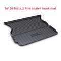 Set of black rubber floor mats for a Tesla car interior