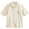 Light apricot Cuban collar men's shirt with bamboo plant and flower pattern