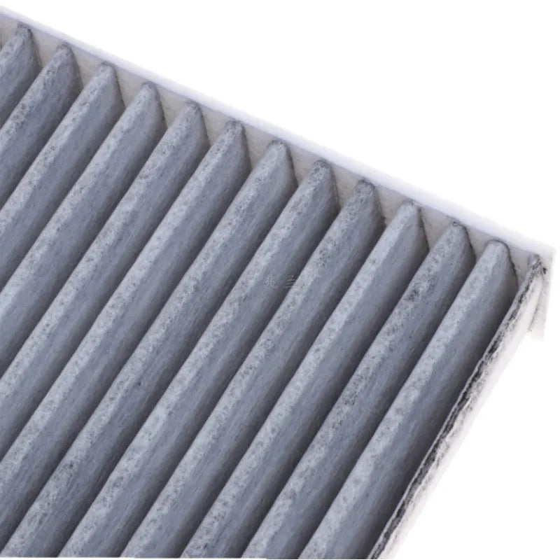Grey air conditioning filter element for Geely cars, measuring 215mm by 210mm.