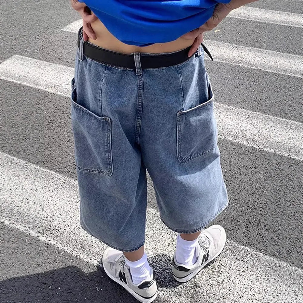 Blue men's high-waist washed denim pirate shorts with a cropped length and straight leg.