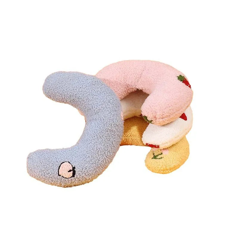 Colourful half moon U-shaped cloth pillow for cats and small dogs to sleep on.