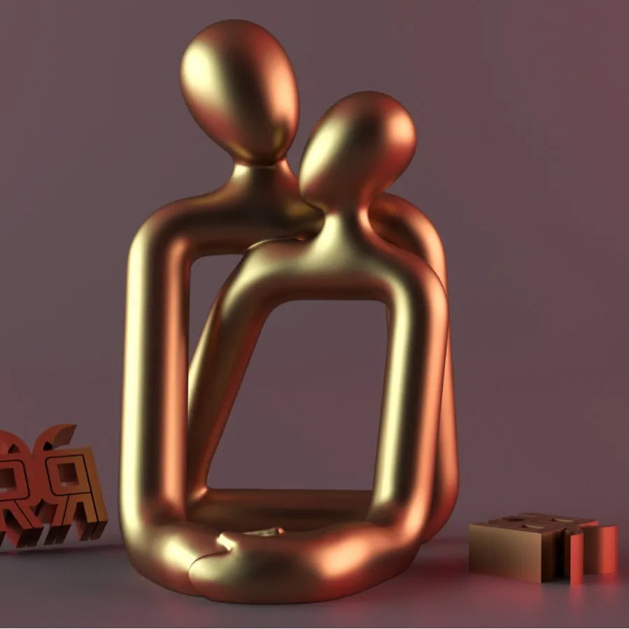 Modern resin sculpture of an embracing couple, available in milky white or gold, for shelf or desk decor.