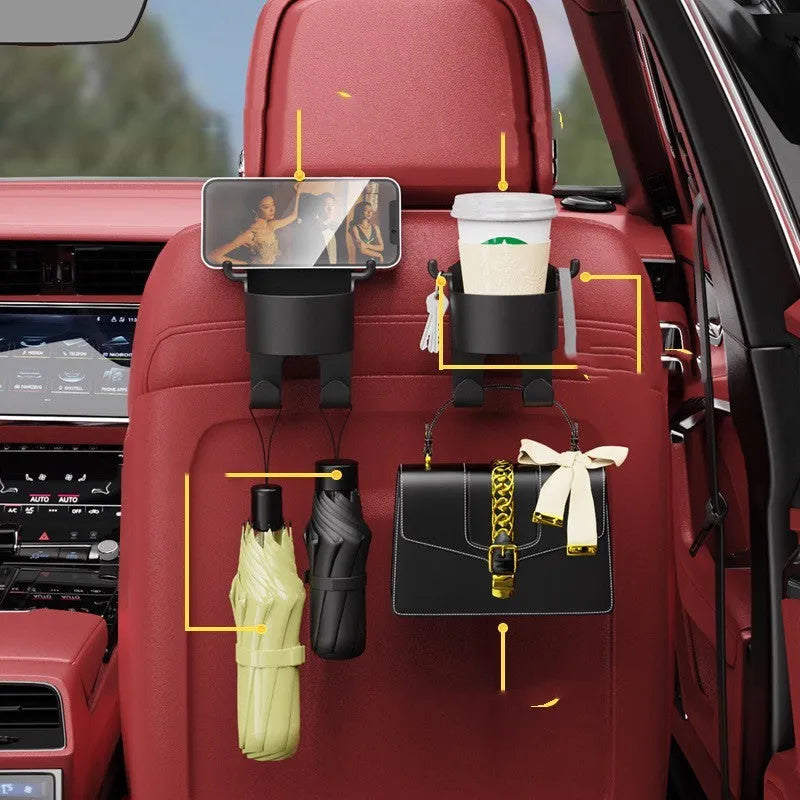 Black plastic car hook seat back organiser with cup holder and dual hooks mounted on headrest