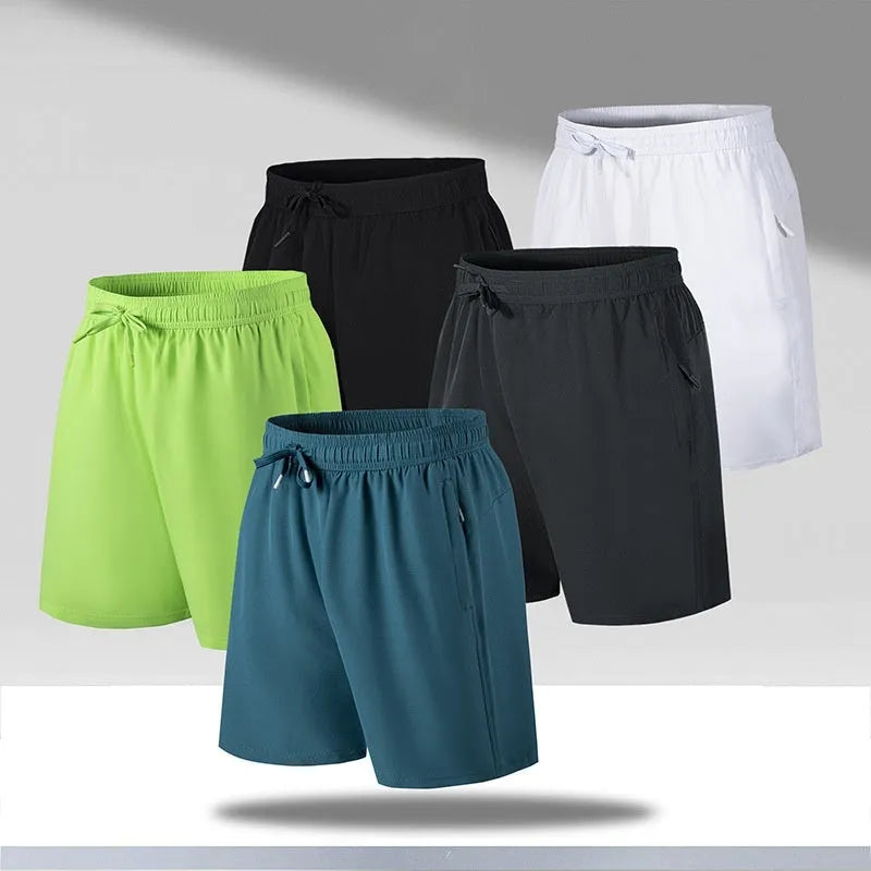 Men's quick-drying loose sports shorts in polyester fabric available in multiple colours and sizes