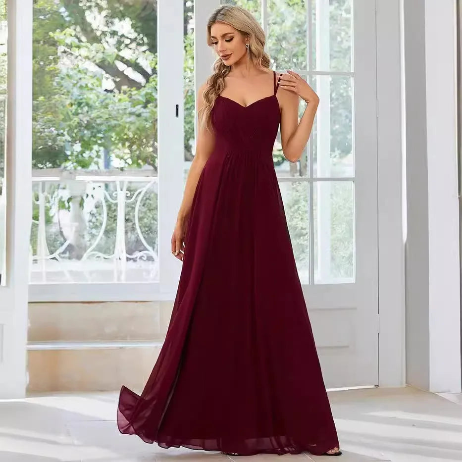 Women's sleeveless long banquet dress with pleated A-line skirt in light green, wine red, navy blue, or purple.