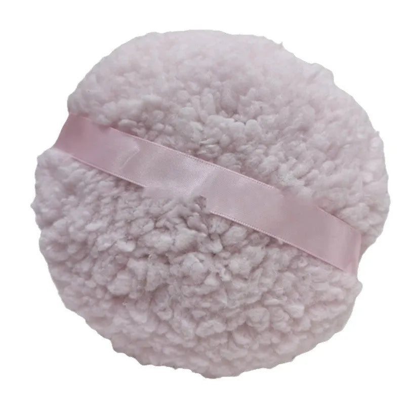 Oversized rectangular plush powder puff for makeup, shown in white, pink, and skin colour options.