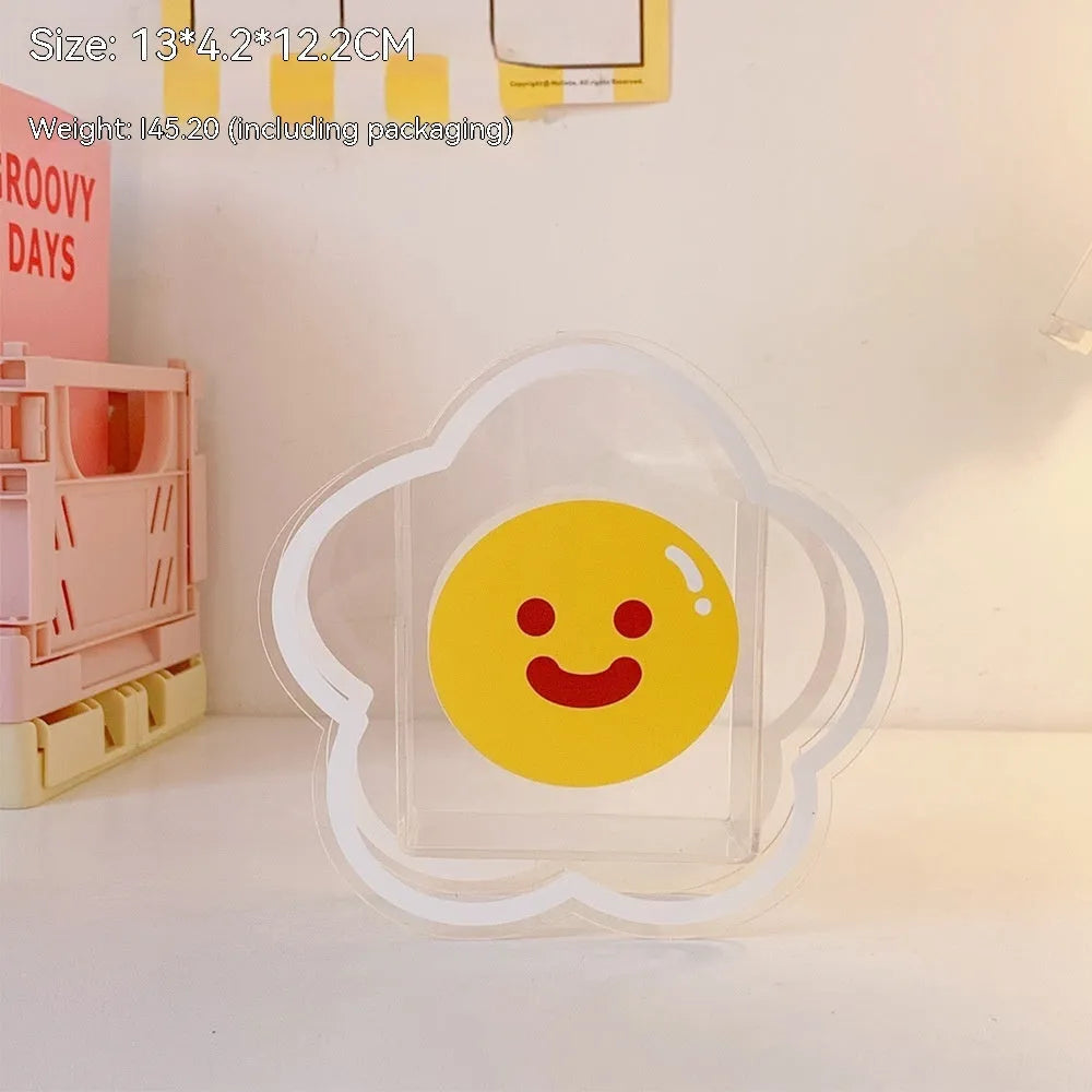 Square clear acrylic storage box with cute character print, showing six design options for desk organisation
