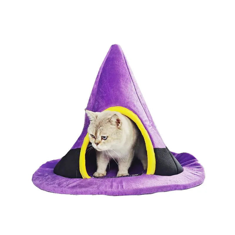 Purple cloth witch hat shaped cat bed for small cats, dimensions 60cm by 45cm.