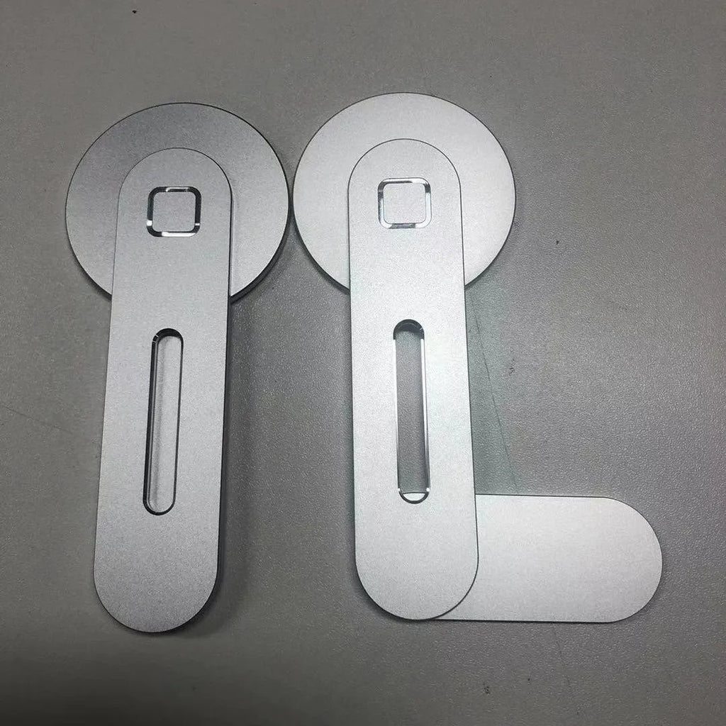 Aluminium alloy magnetic desktop bracket for Apple 12, black, with CNC anodised finish, shown on desk