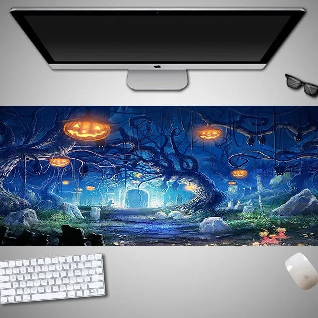 Halloween-themed oversized mouse pad with non-slip rubber cloth backing on a desk