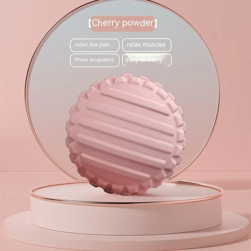 A blue TPR foot massage ball, 6cm in diameter, resting on a plain surface.