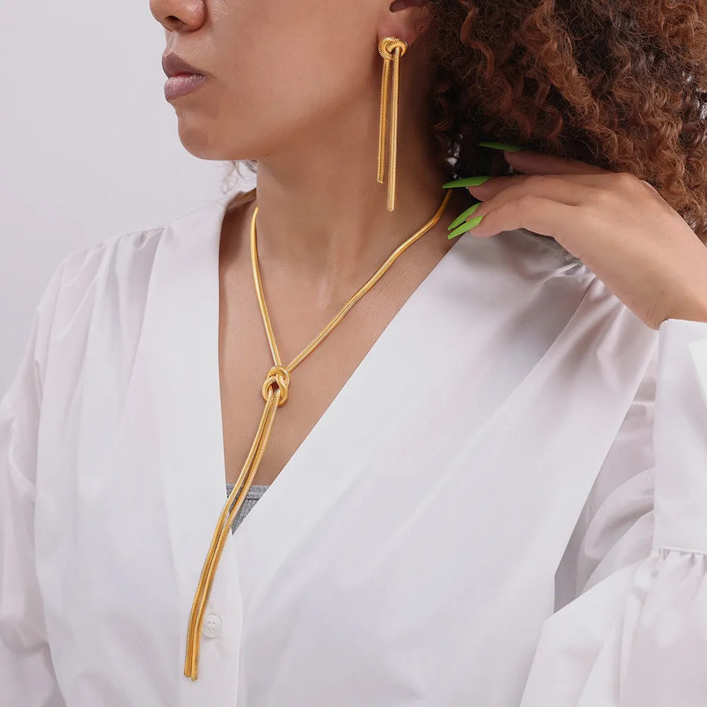 Gold knotted tassel pendant necklace with snake chain and matching earrings set