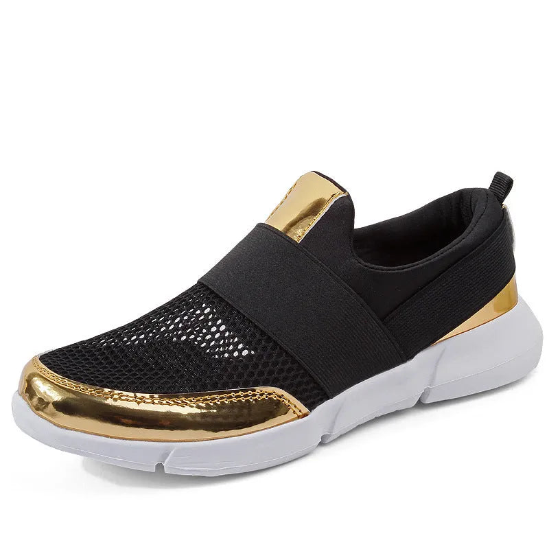 Women's blue low-top casual sneakers with mesh inside on a hard floor surface