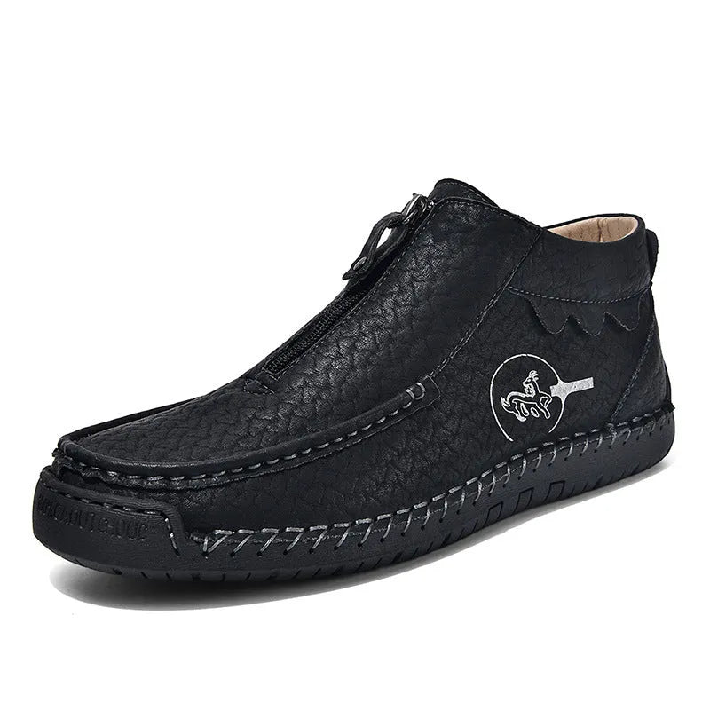 Men's black PU leather slip-on loafers with a round toe and sewn rubber sole on a white background.
