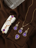 Women's simple disc light luxury quartz bracelet watch set in pink with matching earrings necklace and ring