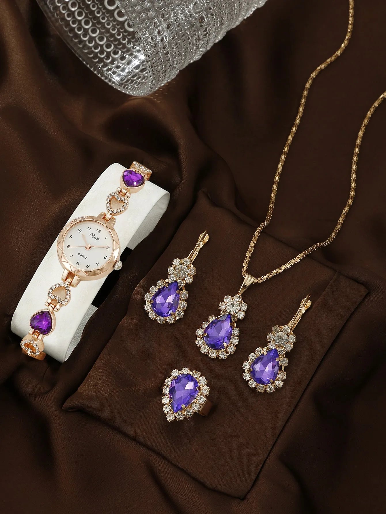 Women's simple disc light luxury quartz bracelet watch set in pink with matching earrings necklace and ring