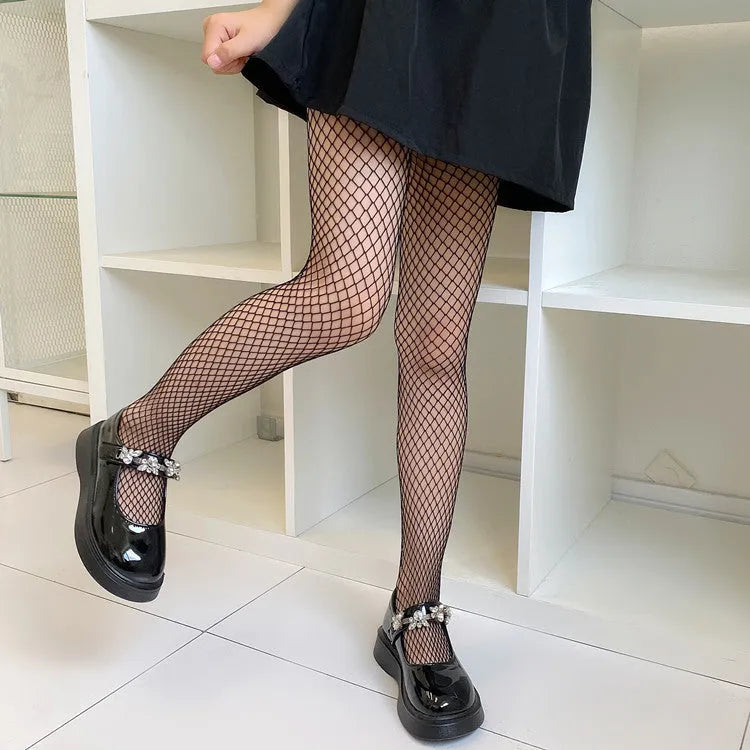 Women's mesh stockings showing large net, medium net and small net patterns in black and white colours