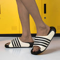 Unisex casual slippers with EVA sole and PVC upper in beige colour