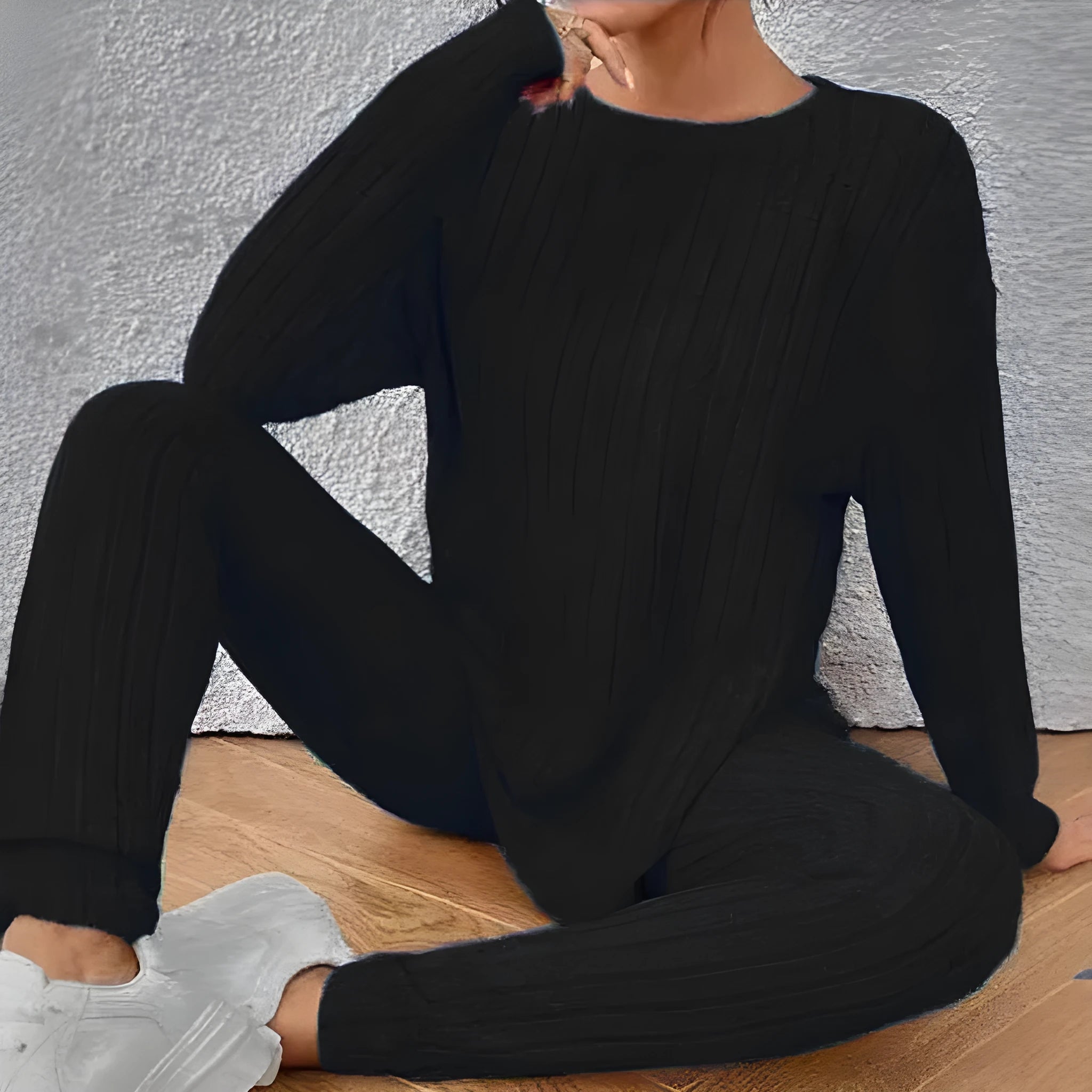 Women's black sunken stripe polyester two-piece loungewear set with top and pants