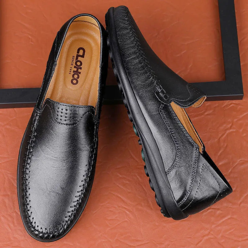 Pair of cowhide men's business casual leather shoes with round toe and rubber sole