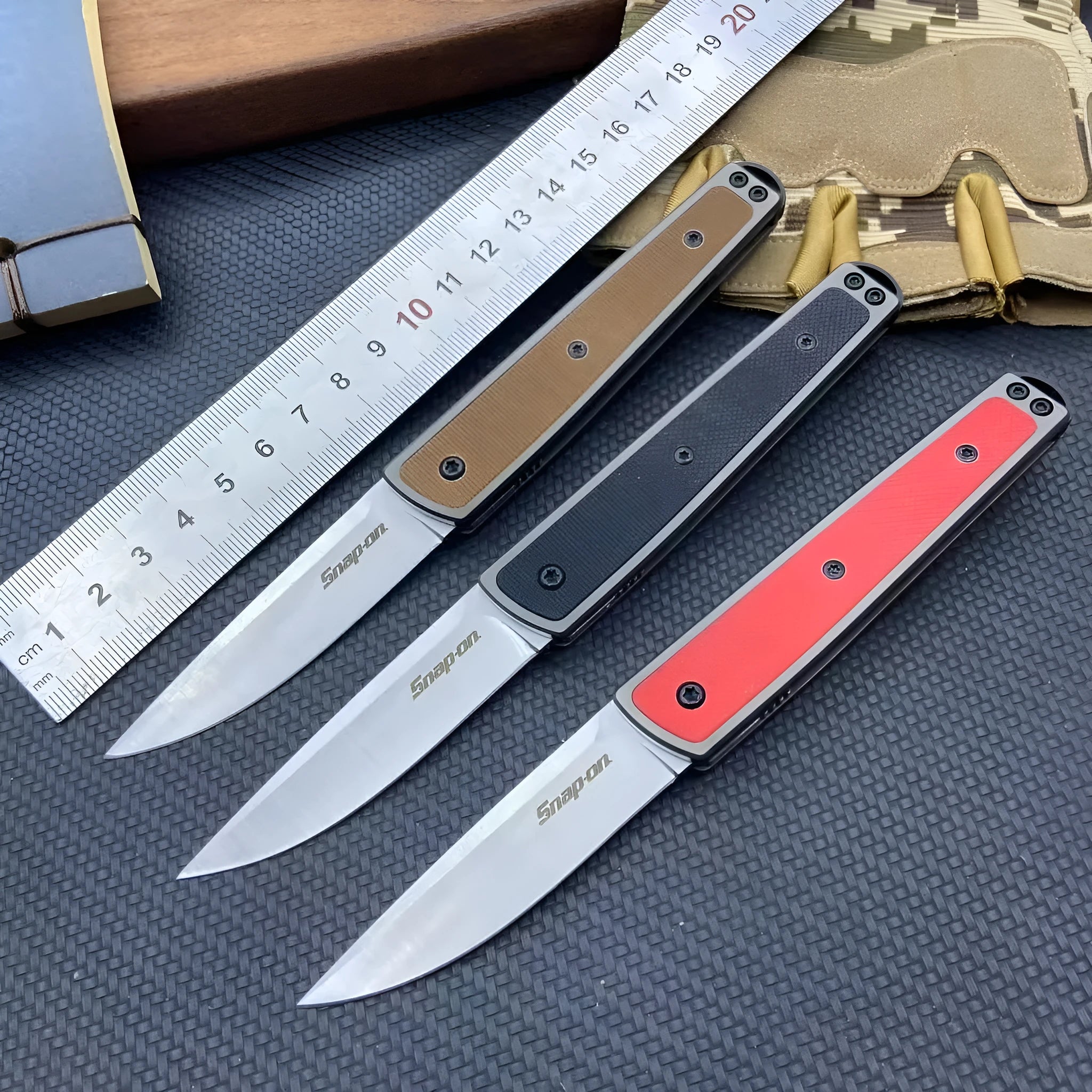 CRKT 7190 folding fruit knife showing black stainless steel blade and handle with dimensions displayed