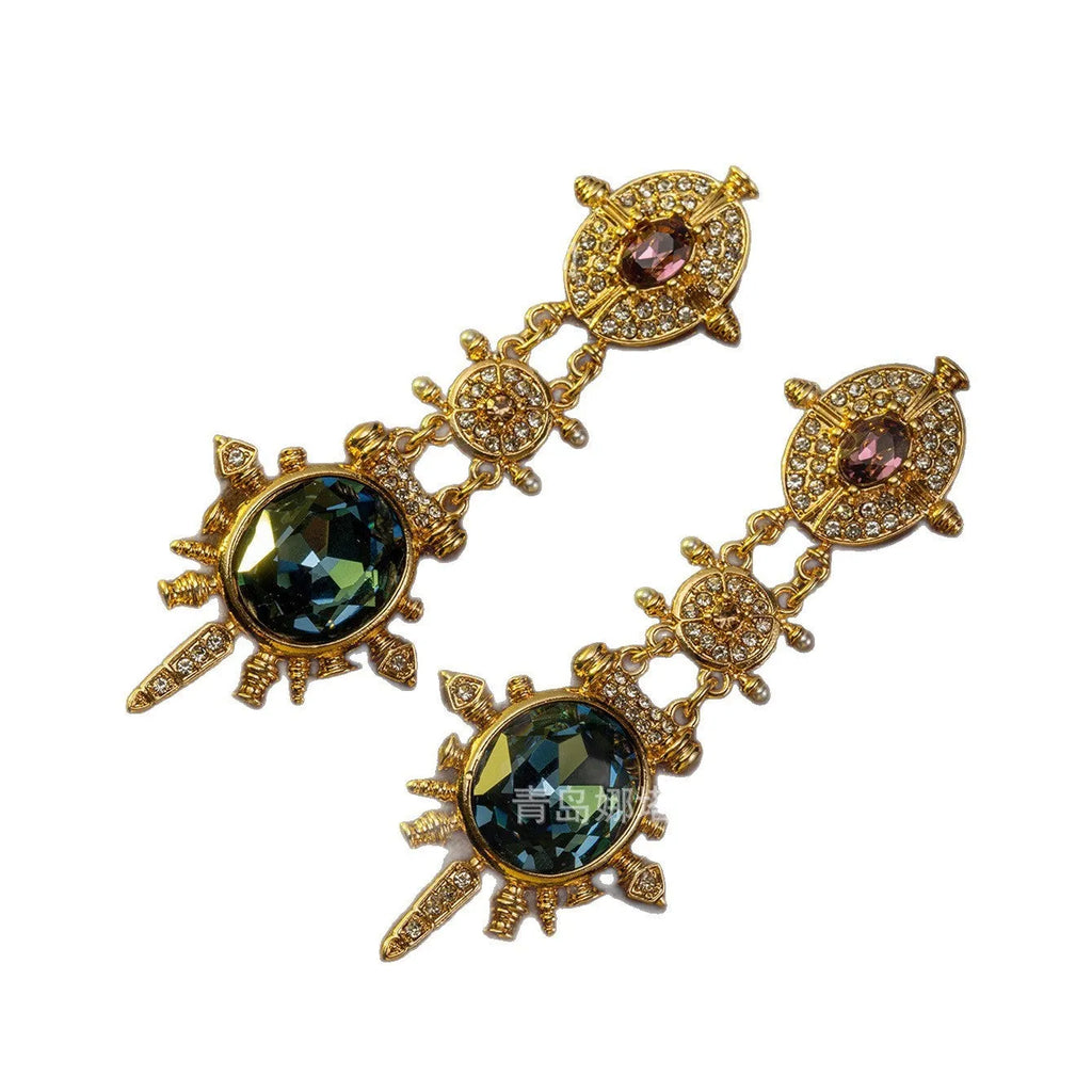 A pair of gold colour alloy stud earrings with geometric round shape in retro court style