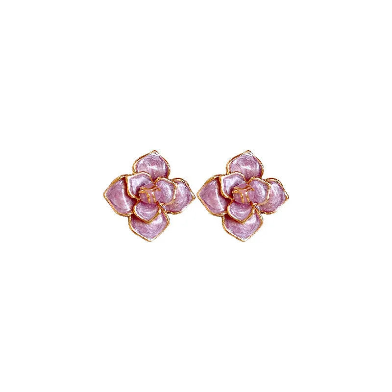 Gold plated purple oil-spot glaze flower stud earrings made from copper on a silver needle post.
