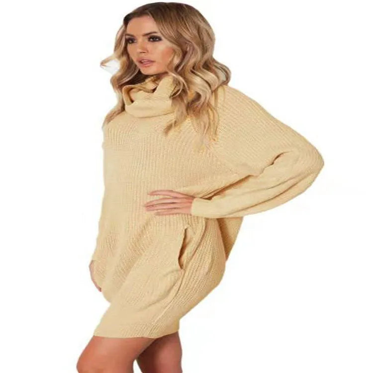 A woman's apricot-coloured pullover sweater with a V-neck lapel collar and side pockets on a hanger.