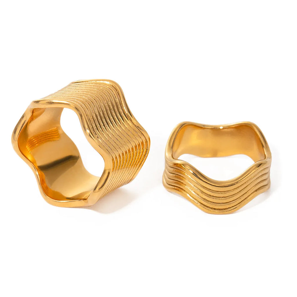 Stainless steel wide surface wave ring with geometric pattern in silver and gold tone options