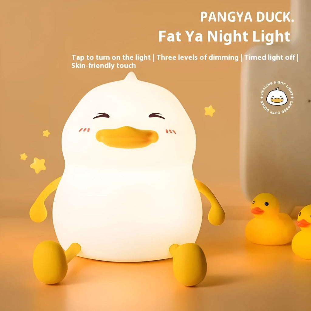 Chubby silicone night lamp with phone holder function showing compact design and adjustable LED lighting