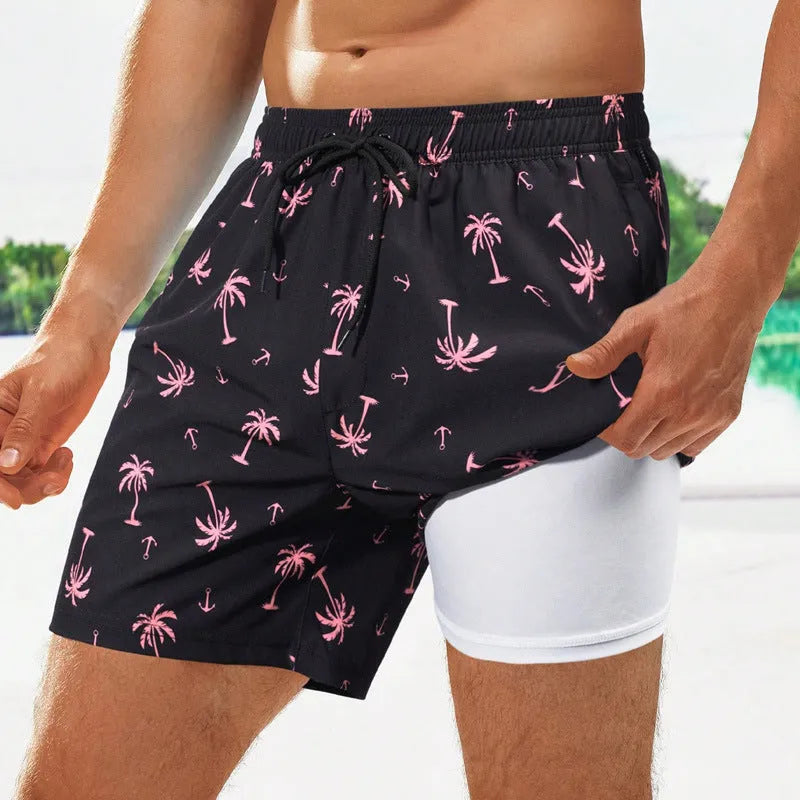 Men's loose fit quick-drying swim trunks in a floral or tropical print colour on a spandex fabric.