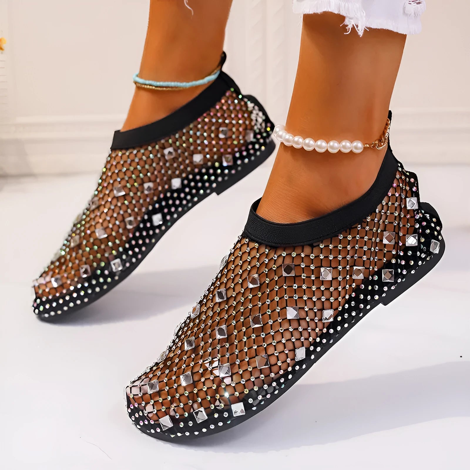 Women's flat mesh sandals with colourful rhinestone decoration on heel strap