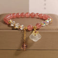 Women's natural crystal bracelet with strawberry quartz and white agate beads, auspicious clouds design, 40 grams weight