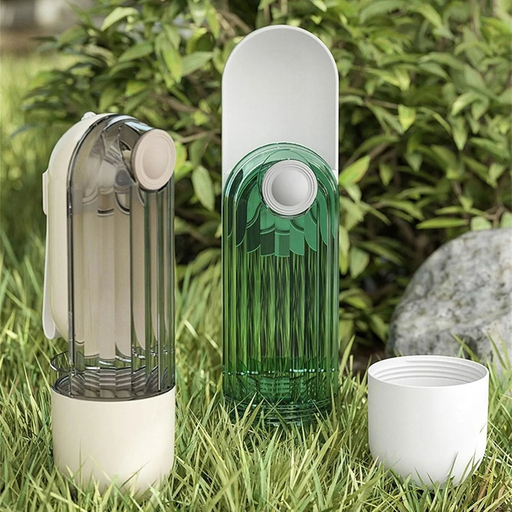 Beige foldable dog water bottle with food dispenser showing collapsible design and drinking tray