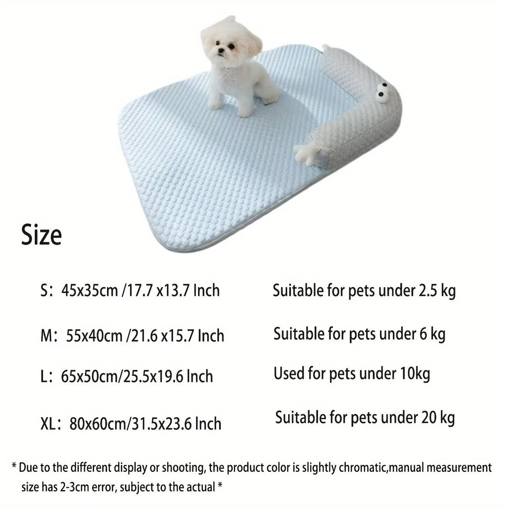 Blue big-eyed monster design breathable pet cooling bed for dogs and cats on a wooden floor.