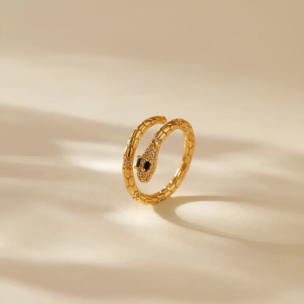 Snake-shaped adjustable finger ring with gold colour finish and detailed animal design