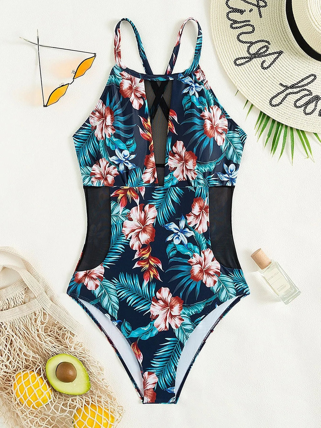 Women's deep V-neck one-piece swimsuit in a printed gradient pattern, showing European/American fit.