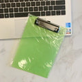 A4 blue plastic writing pad portfolio folder with metal clip, showing transparent front plate.