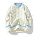 Man wearing a loose fit light blue modal acrylic blend long sleeve pullover sweater
