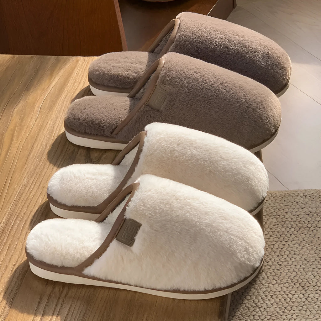 Solid colour PVC plush winter slippers for men and women on a home floor