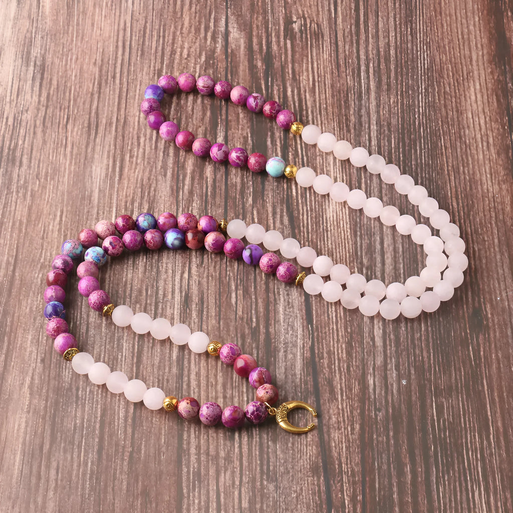 Pink crystal Emperor Stone round pendant necklace on a casual chain