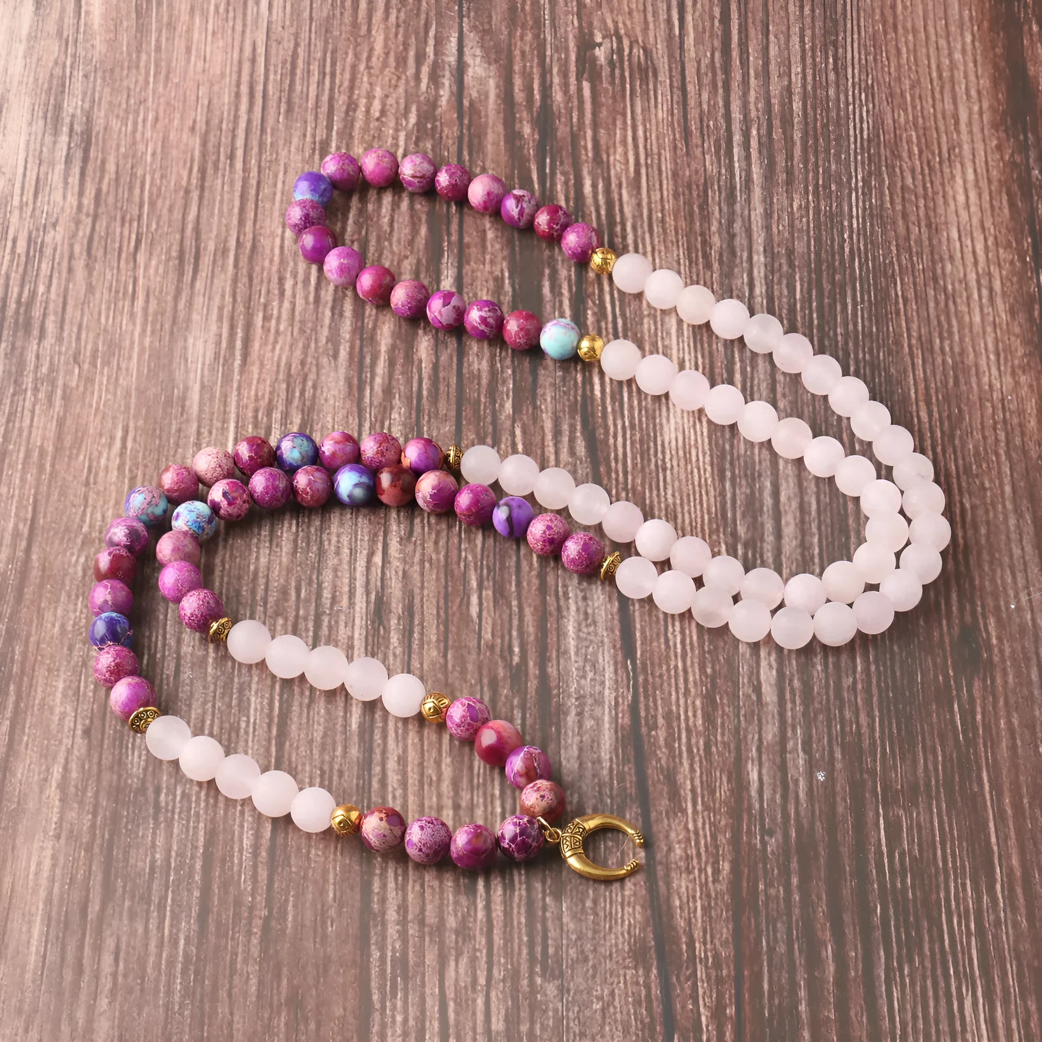 Pink crystal Emperor Stone round pendant necklace on a casual chain