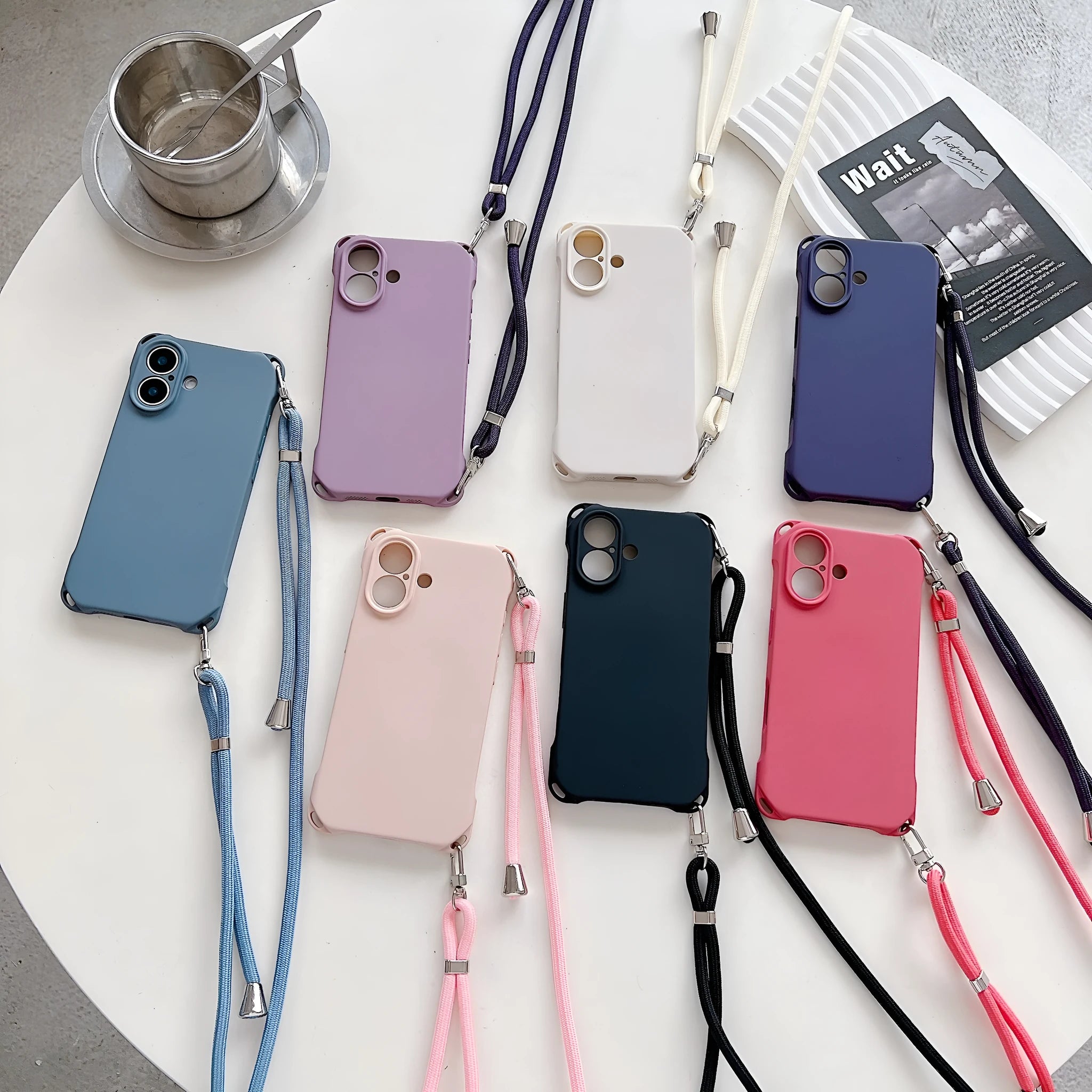 Four-corner cross lanyard liquid silicone phone case for Apple iPhone 16, soft anti-fall, antique white colour