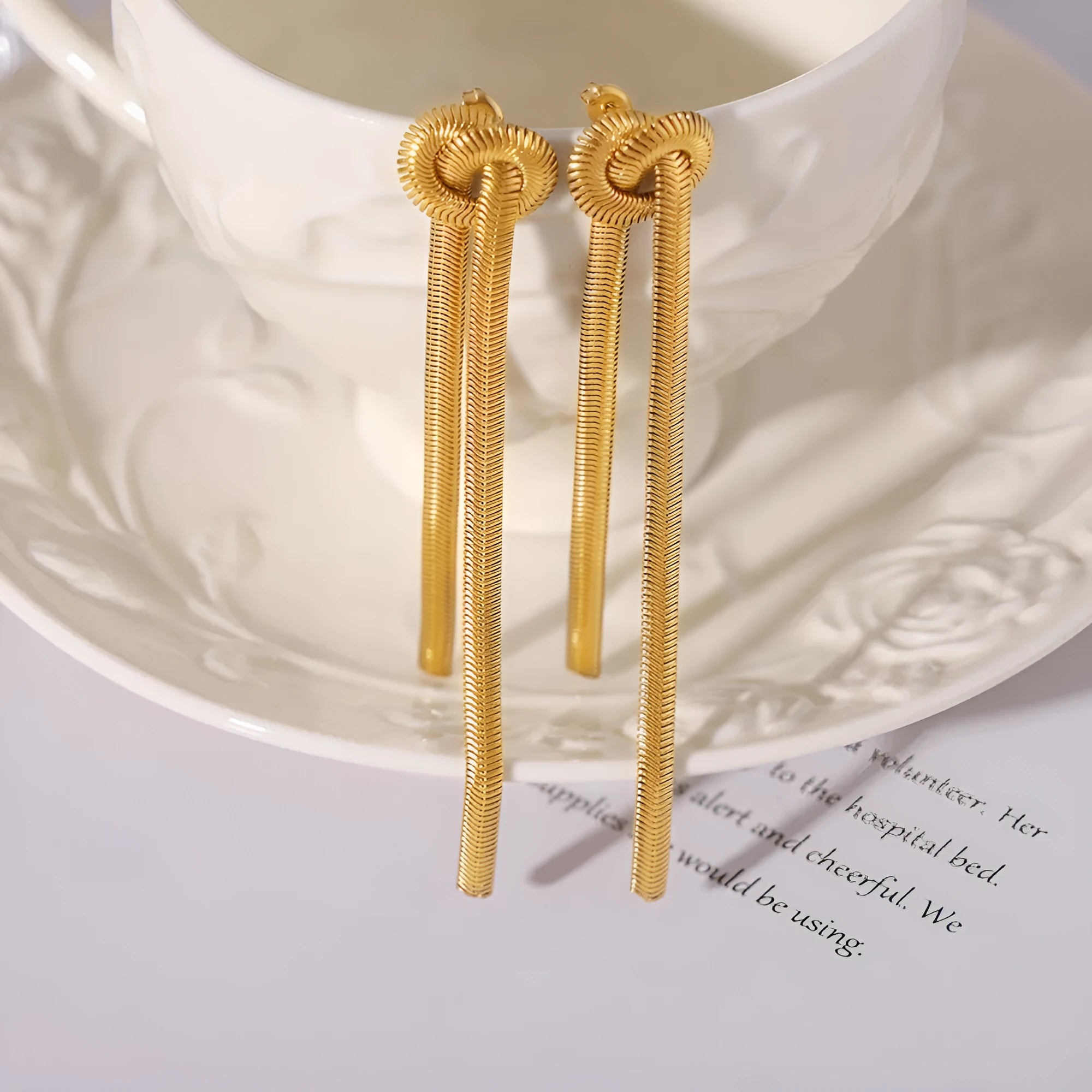 Gold knotted tassel pendant necklace with snake chain and matching earrings set