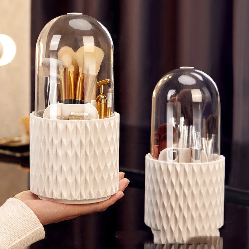 Transparent rotating makeup brush storage box with white accents and removable dust-protecting lid