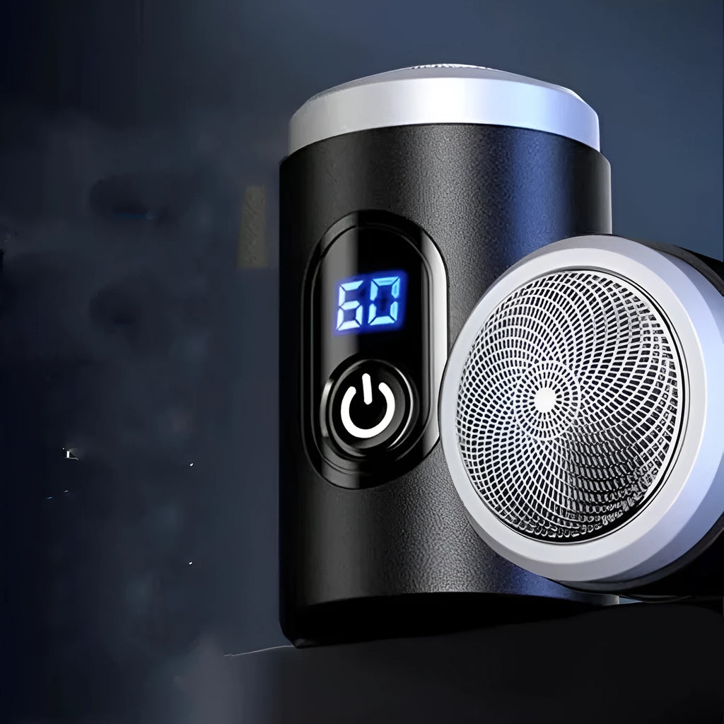 Black portable USB rechargeable shaver with cleaning brush and cable on a white background.