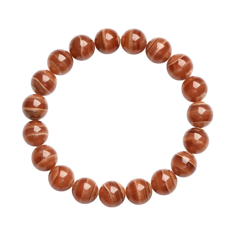 Natural Peruvian rhodochrosite bead bracelet with geometric design and ruyi element