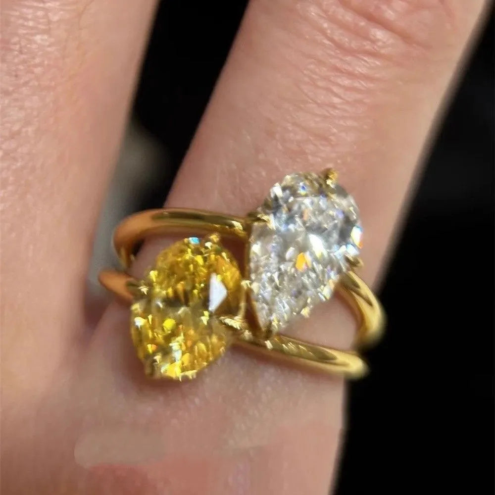 Geometric open ring with water drop double sheng stone zircon design in copper construction