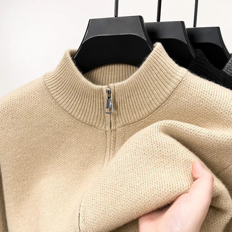Men's grey stand collar knitted zip cardigan with a loose, thickened fit on a hanger.